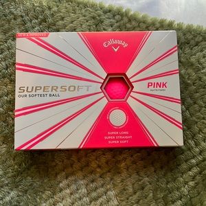 Never used pink golf balls